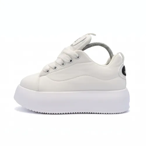 Contemporary Coach Platform with a bold design and a high sole, a comfortable casual shoe for walking and daily use